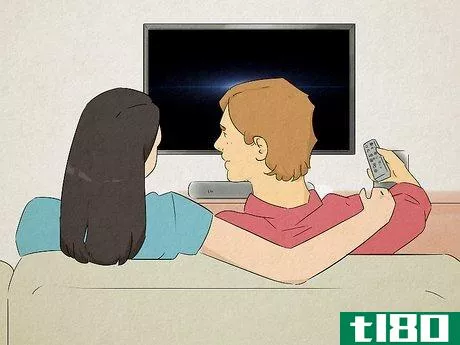 Image titled Man turning off the television to talk to his girlfriend.