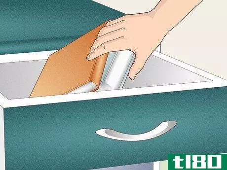 Image titled Adjust Your Cabinet Drawers Step 1