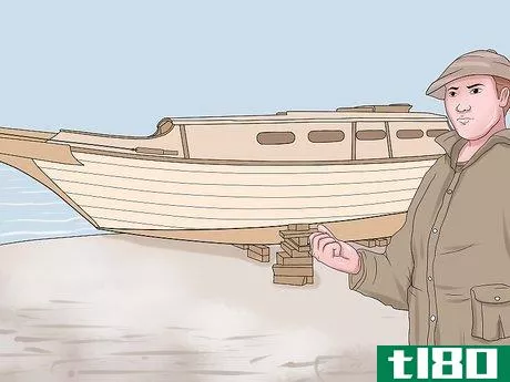 如何填塞一艘旧木船(caulk an old wooden boat)