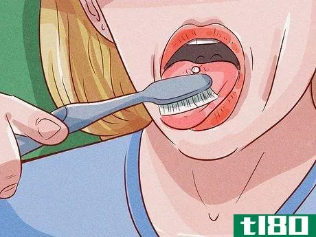 Image titled Brush Your Teeth with a Tongue Piercing Step 10