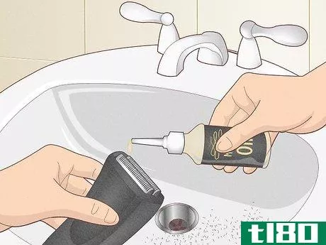 Image titled Apply Oil to an Electric Shaver Step 7