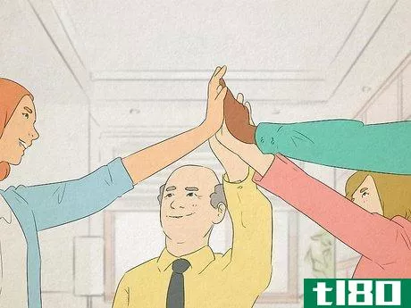 Image titled A group of employees all high-fiving each other.