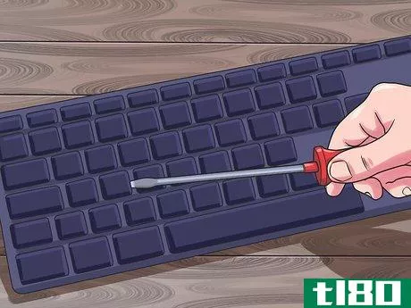 Image titled Clean Under Laptop Keyboard Keys Step 1