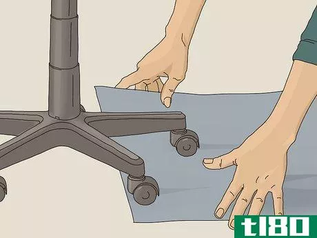 Image titled Clean the Wheels of a Rolling Desk Chair Step 1