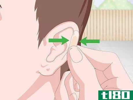 Image titled Cover an Ear Piercing for Swimming Step 4