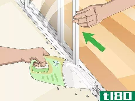 Image titled Clean Sliding Glass Door Tracks Step 1