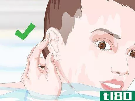 Image titled Cover an Ear Piercing for Swimming Step 6