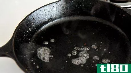 Image titled Clean Your Cast Iron Skillet or Pot After Daily Use Step 3