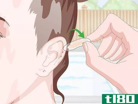 Image titled Cover an Ear Piercing for Swimming Step 7