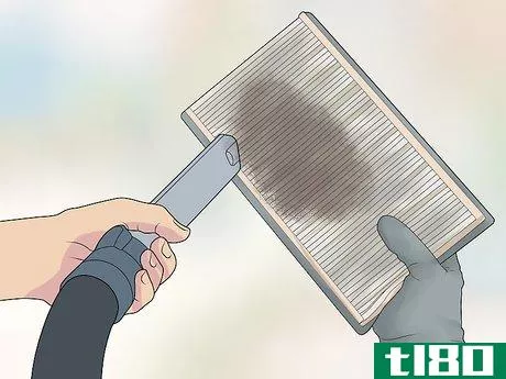 Image titled Clean an Air Filter Step 2