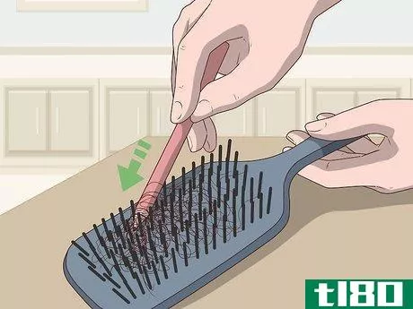 Image titled Clean a Paddle Brush Step 1.jpeg