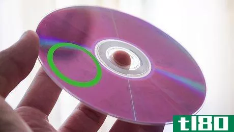 Image titled Fix a Scratched Video Game Disk with White Toothpaste Step 1