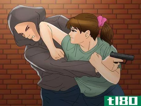 Image titled Disarm a Criminal with a Handgun Step 12