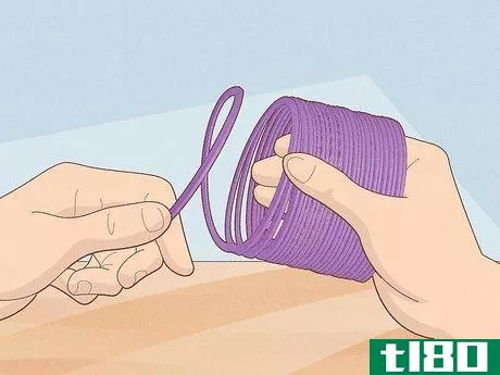Image titled Fix a Slinky Step 6