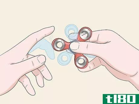 Image titled Do Fidget Spinner Tricks Step 2