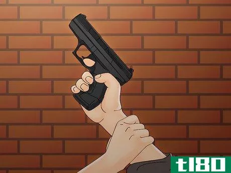 Image titled Disarm a Criminal with a Handgun Step 2