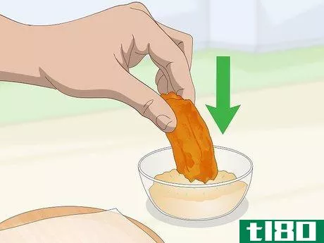 Image titled Eat Chicken Wings Step 7