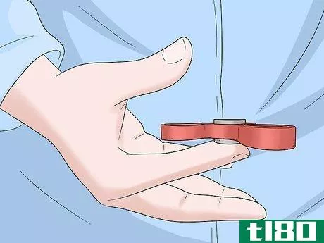 Image titled Do Fidget Spinner Tricks Step 7