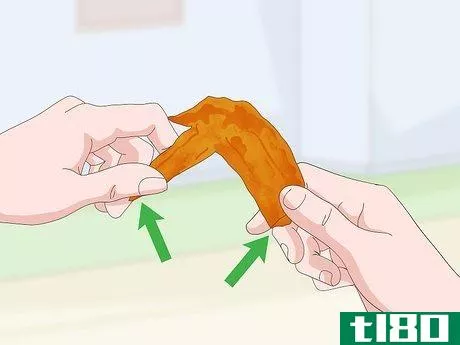 Image titled Eat Chicken Wings Step 9