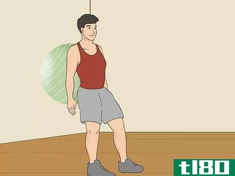 Image titled Do an Exercise Ball Squat Step 2.jpeg