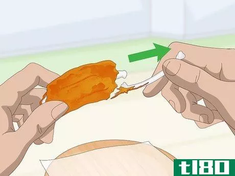 Image titled Eat Chicken Wings Step 5