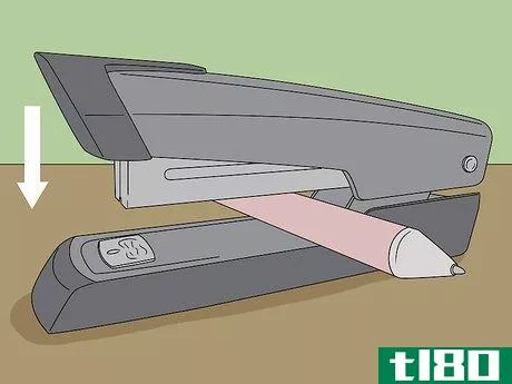 Image titled Fix a Jammed Manual Stapler Step 1