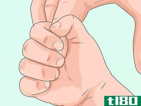 Image titled Encourage Your Baby to Build Finger Muscles Step 1