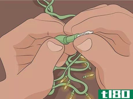 Image titled Fix Christmas Lights That Are Half Out Step 14