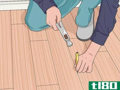 Image titled Fix Loose Wood Parquet Flooring Step 2
