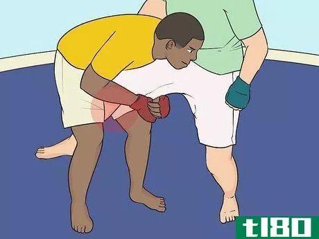 Image titled Do a Single Leg Takedown Step 3.jpeg