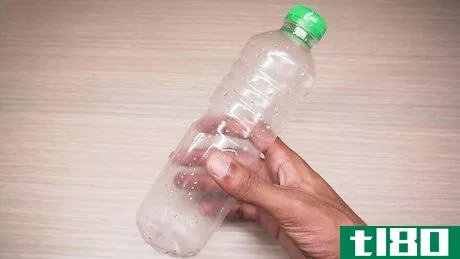 Image titled Do the Water Bottle Flipping Challenge Step 1