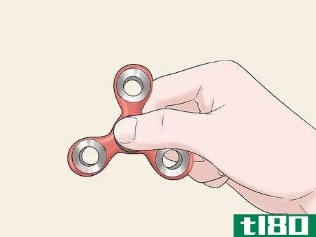 Image titled Do Fidget Spinner Tricks Step 1