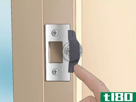 Image titled Hold a Door Open with a Coin Step 7