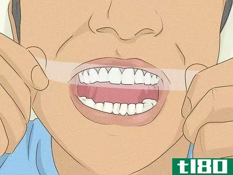 Image titled Get Whiter Teeth at Home Step 1