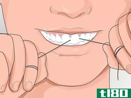 Image titled Pick Your Teeth Without a Toothpick Step 4