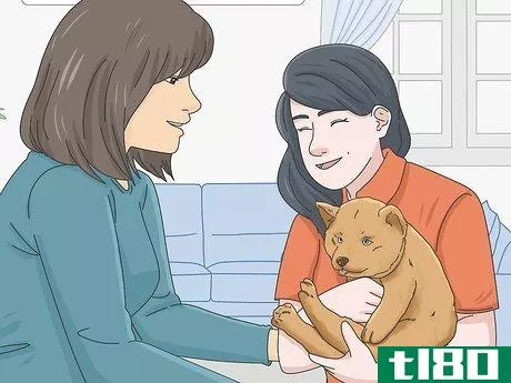 Image titled Get a Puppy to Stop Growling when You Pick Them Up Step 8