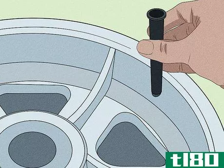 Image titled Install Valve Stems on Tires Step 12