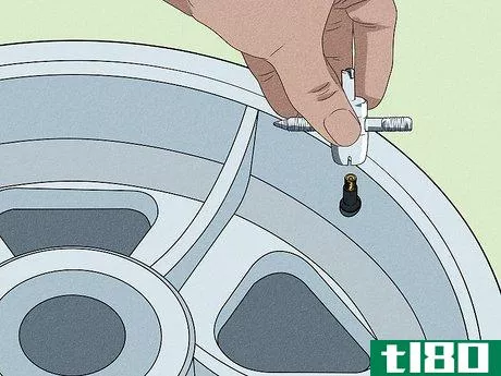 Image titled Install Valve Stems on Tires Step 9