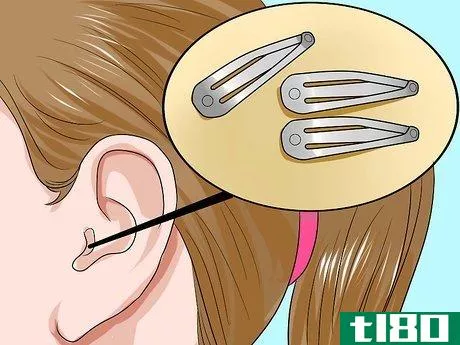 Image titled Get Something out of Your Ear Step 1