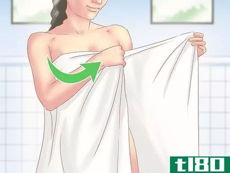 Image titled Make a Body Wrap Towel After a Shower Step 4