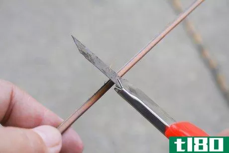 Image titled Make a Broom Using a Coconut Leaf Step 7