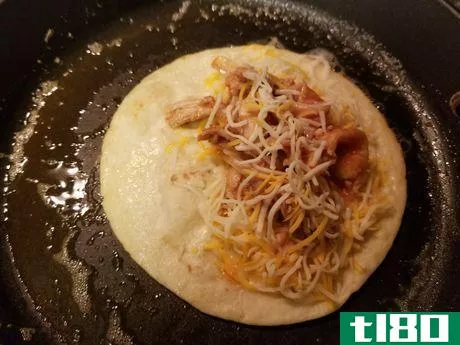 Image titled Added_chicken_in_tortilla