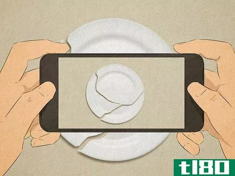 Image titled Person taking a photo of a broken plate on their phone to have as evidence.