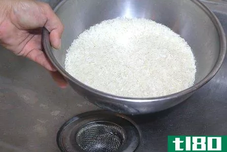 如何用电饭煲做茉莉花饭(make jasmine rice in a rice cooker)