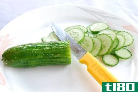 Image titled Slice cucumbers Step 1
