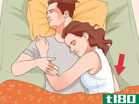 Image titled Avoid Trapping Your Arm While Snuggling in Bed Step 1