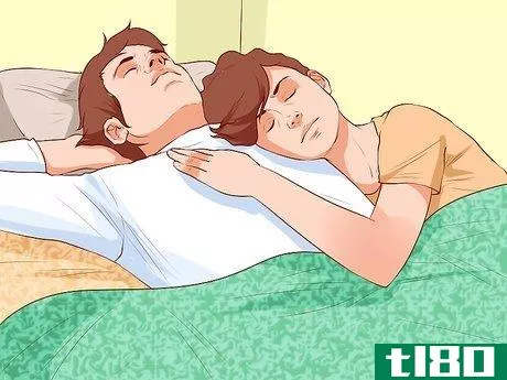 Image titled Avoid Trapping Your Arm While Snuggling in Bed Step 2