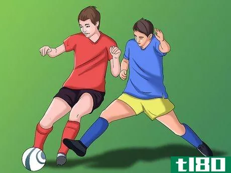 Image titled Slide Tackle in Football_Soccer Step 2