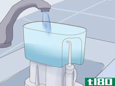 Image titled Use a Waterpik Water Flosser Step 4
