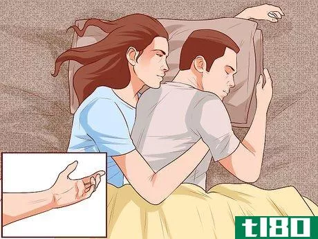 Image titled Avoid Trapping Your Arm While Snuggling in Bed Step 7